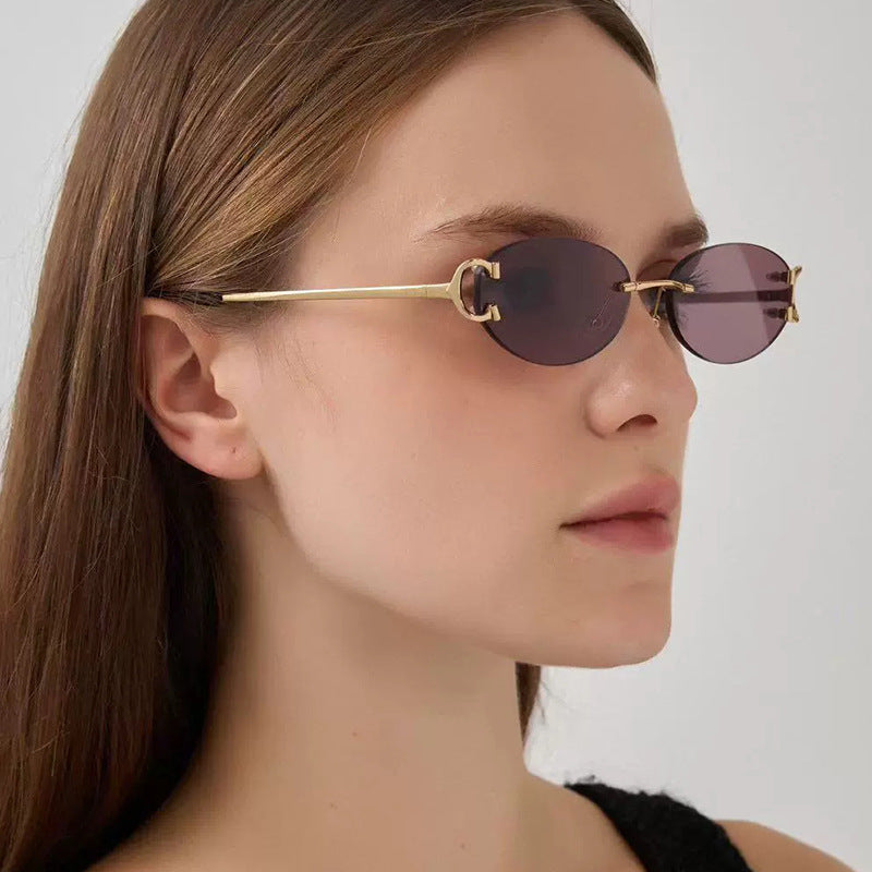 Women's elegant oval-shaped sunglasses with fashionable metal frame Kalsten