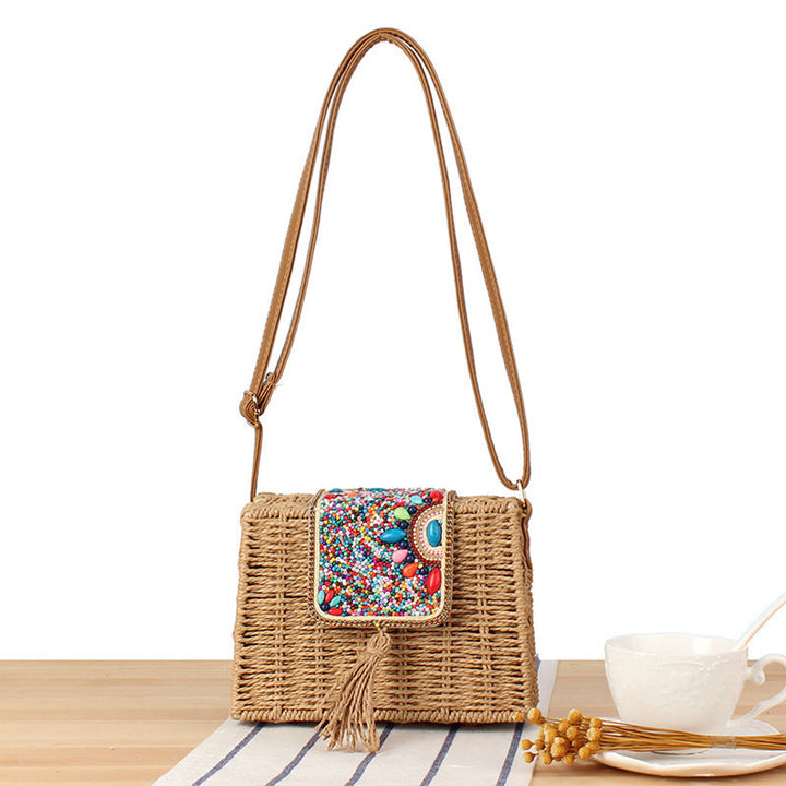 Fashionable straw shoulder bag with unique decor Kalsten
