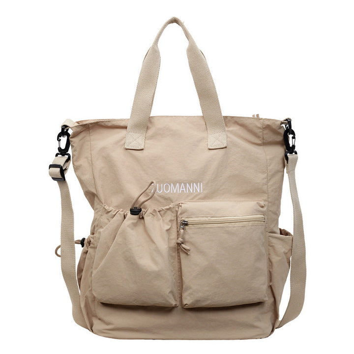 Tote bag with multifunctional outer pockets and adjustable shoulder strap Kalsten
