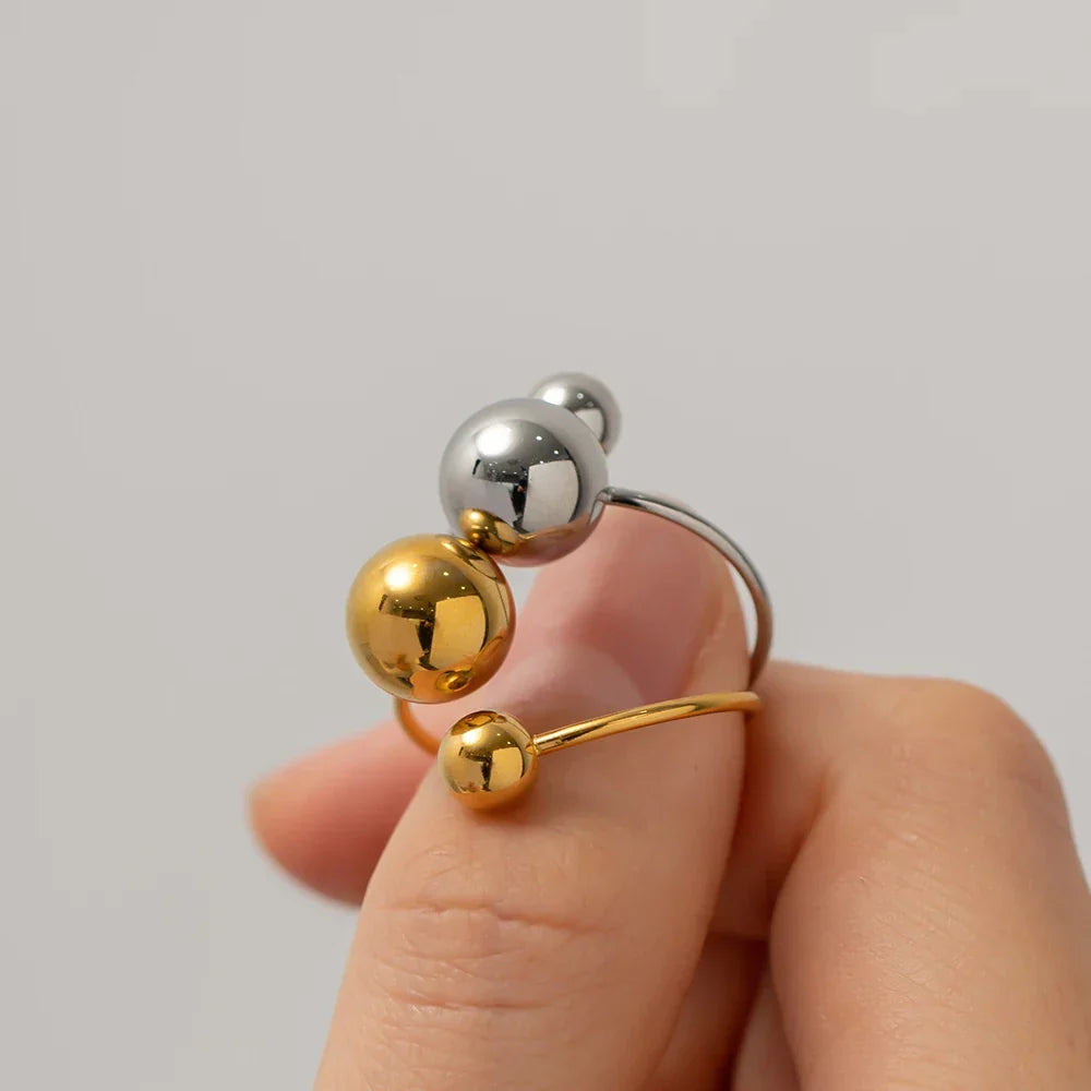 Skanto | 18k Bold Two Ball Open Ring