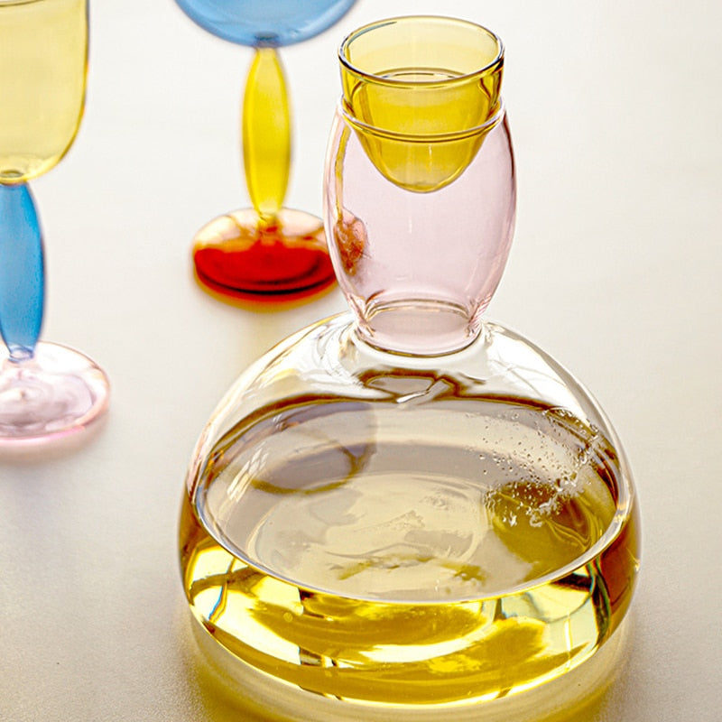 Kalsten | Chalice and carafe made of colored glass by Phillips