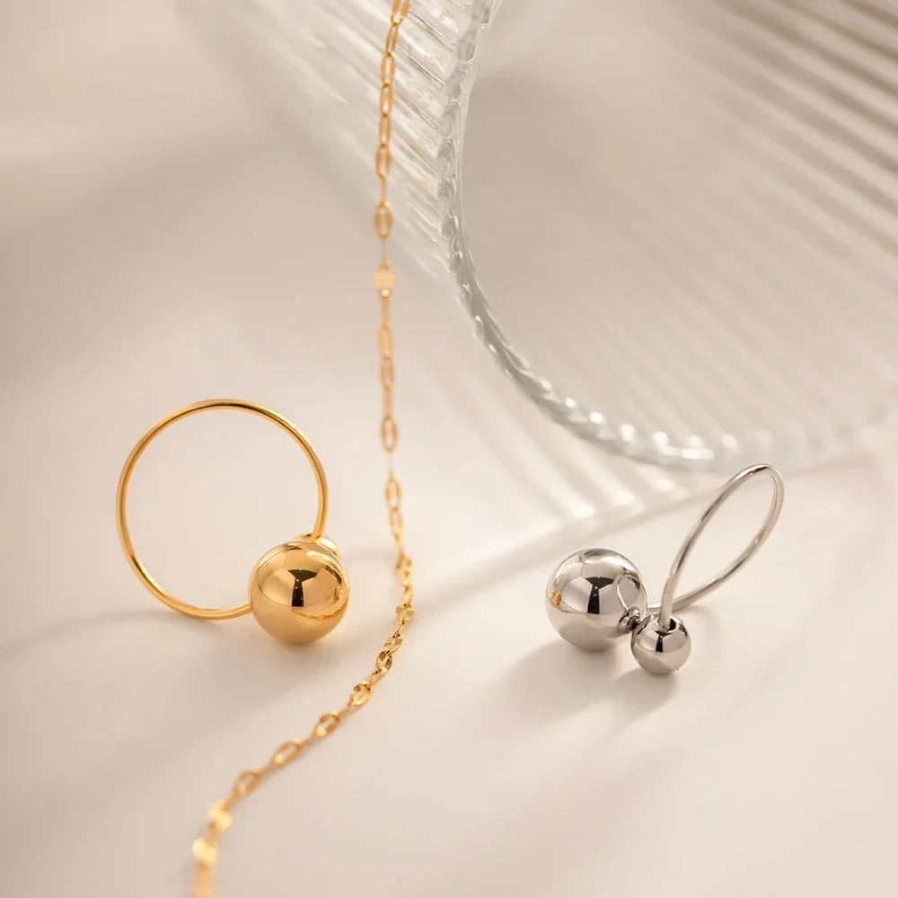 Skanto | 18k Bold Two Ball Open Ring