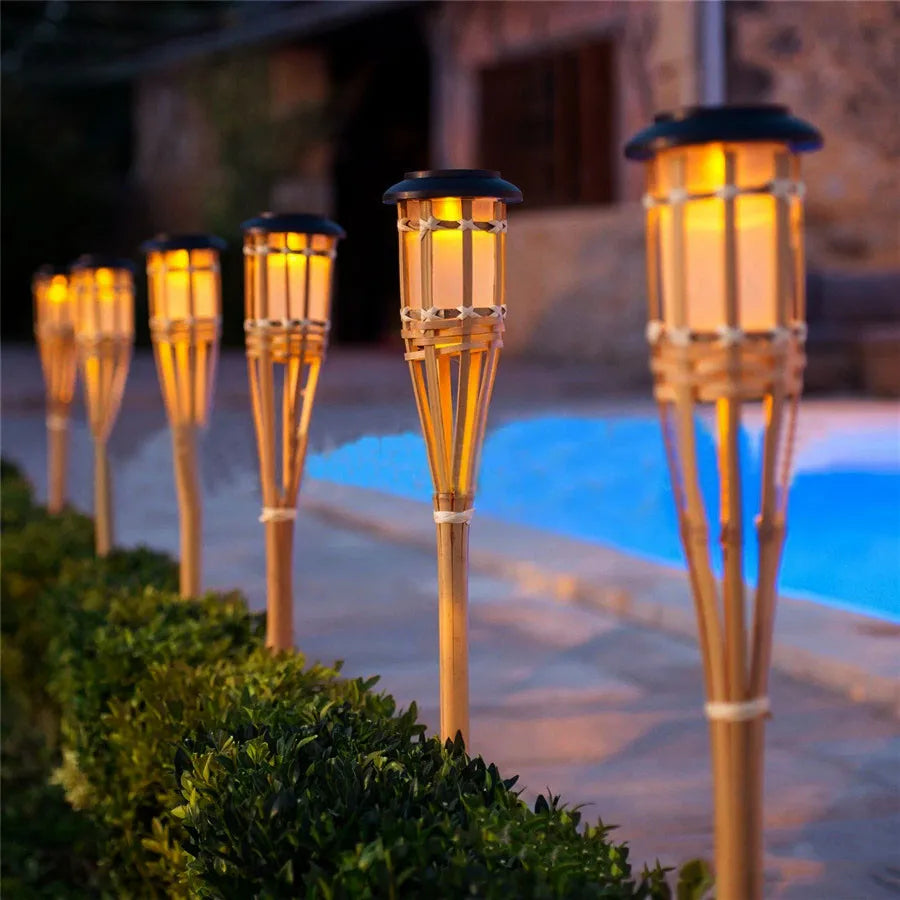 Solar-powered garden torches in bamboo design – Weatherproof LED decorative lighting for outdoors | Kalsten