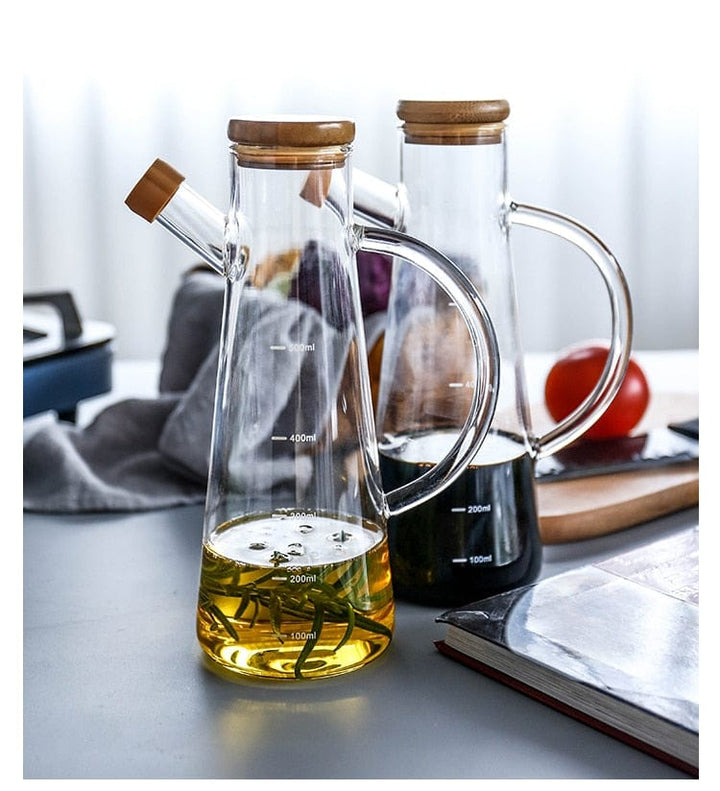Transparent glass oil bottle with handle | Kalsten