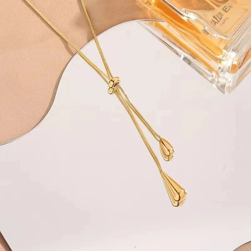 Skanto | Adjustable Pull Drop Lariat Necklace and Earrings
