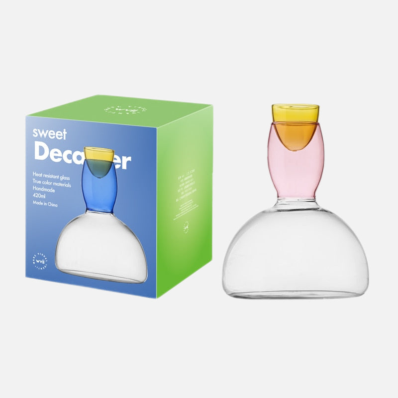 Kalsten | Chalice and carafe made of colored glass by Phillips