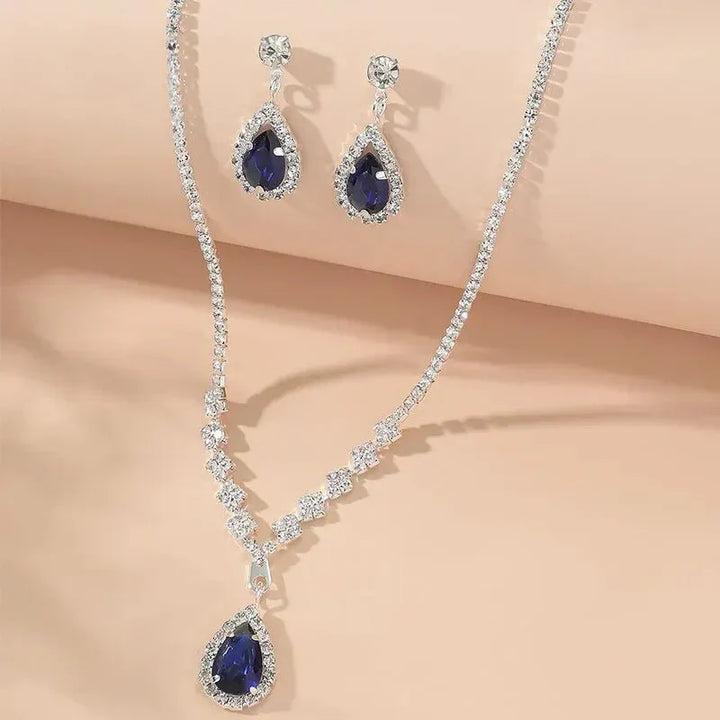 Kalsten | Shimmering Blue Teardrop Diamond Necklace and Earrings Set