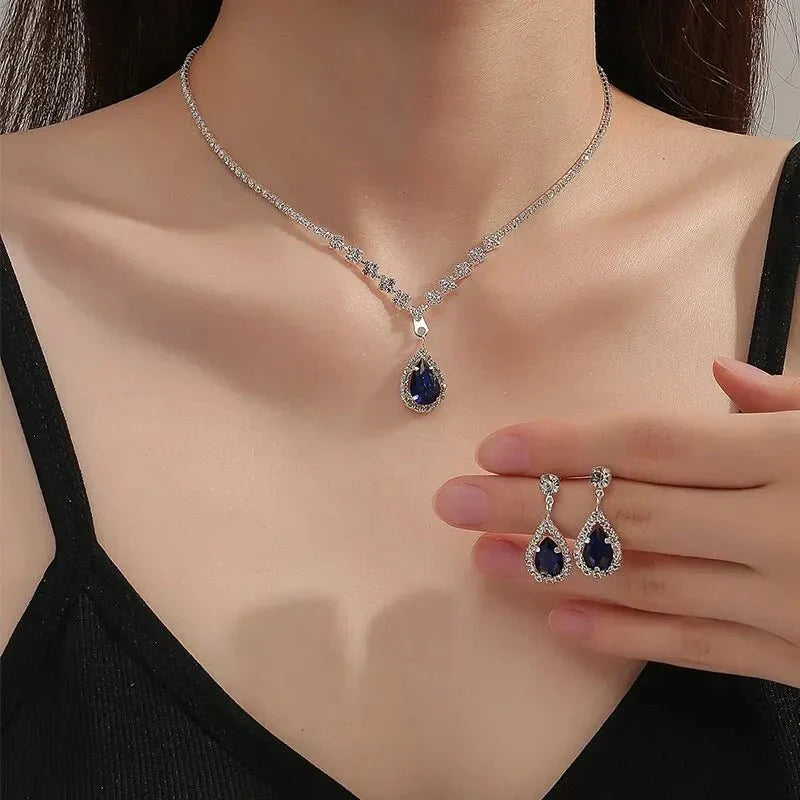 Kalsten | Shimmering Blue Teardrop Diamond Necklace and Earrings Set