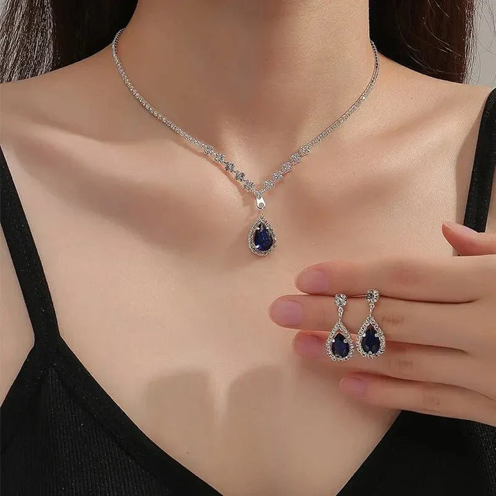 Kalsten | Shimmering Blue Teardrop Diamond Necklace and Earrings Set