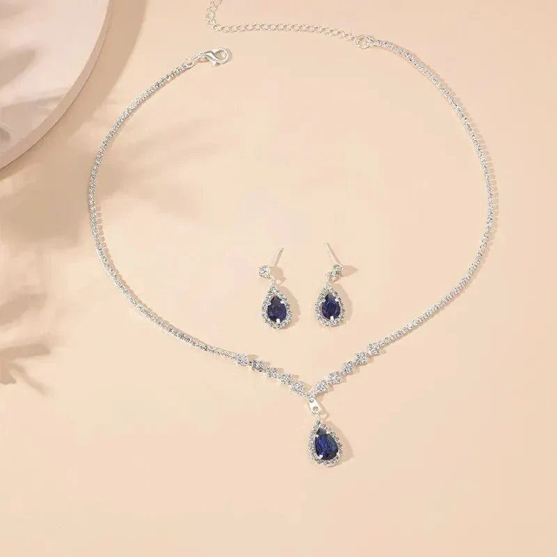 Kalsten | Shimmering Blue Teardrop Diamond Necklace and Earrings Set