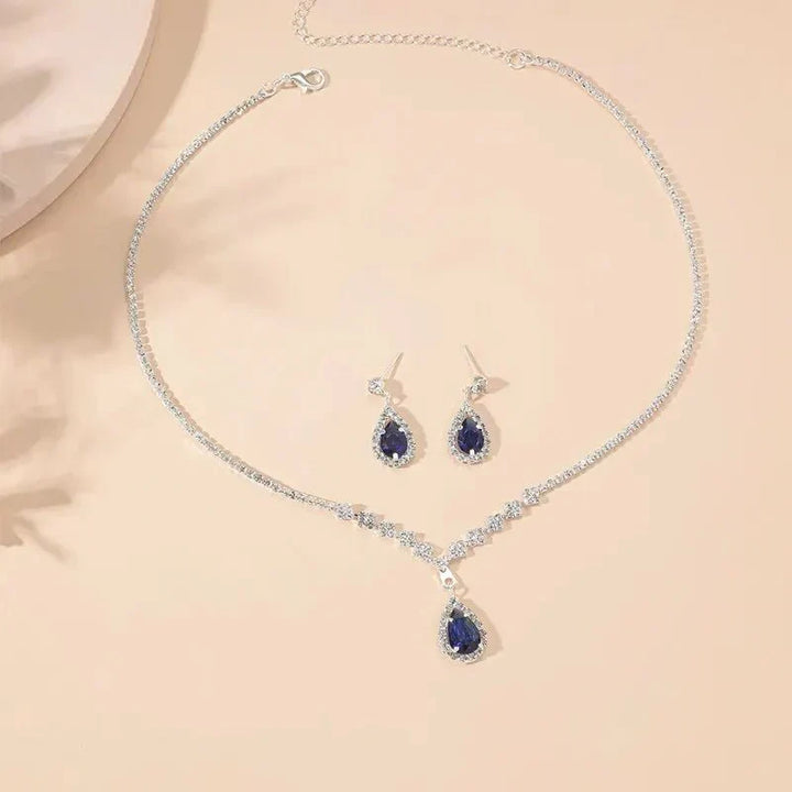 Kalsten | Shimmering Blue Teardrop Diamond Necklace and Earrings Set