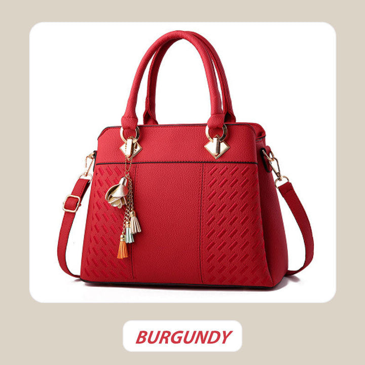 Kalsten | Elegant women's bag with tassel pendant