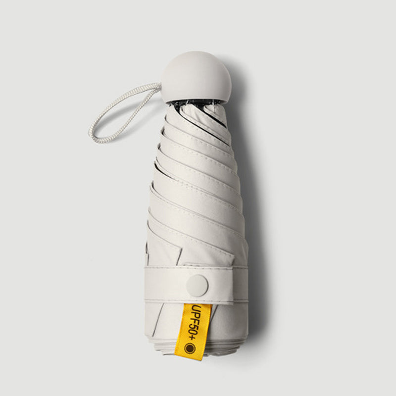 Capsule pocket umbrella with sun protection | Kalsten