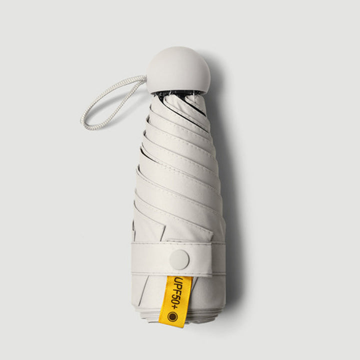 Capsule pocket umbrella with sun protection | Kalsten